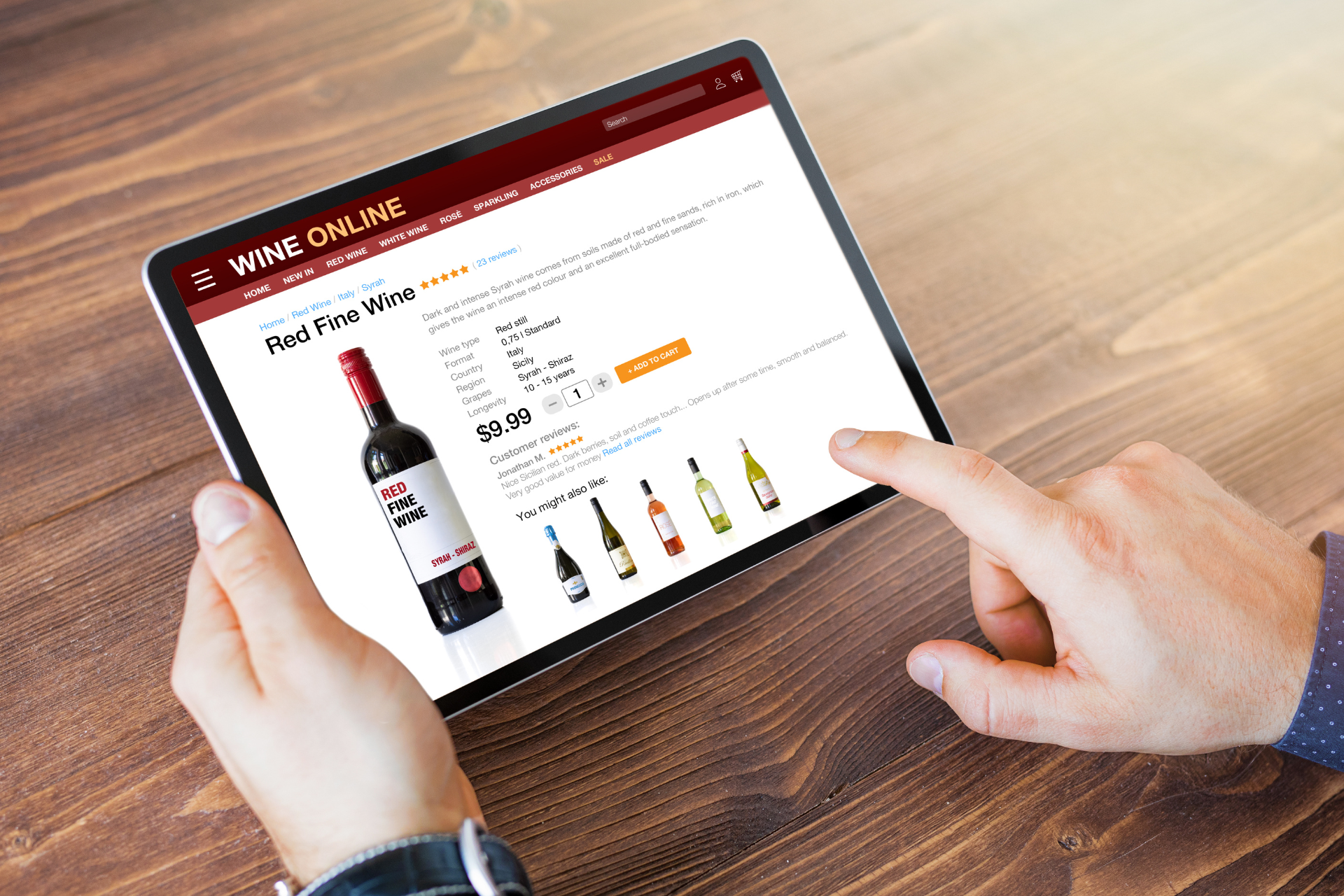 Person using wine ecommerce website to buy wine online