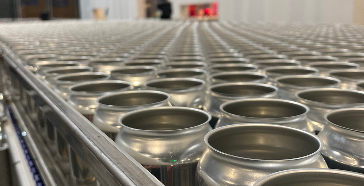 Cans of beer ready to be filled at the brewery 