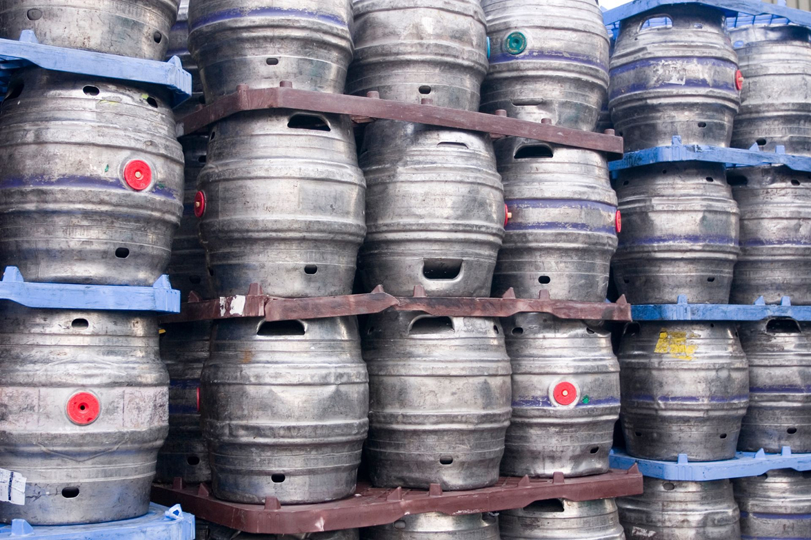 Stacks of beer barrels on crates