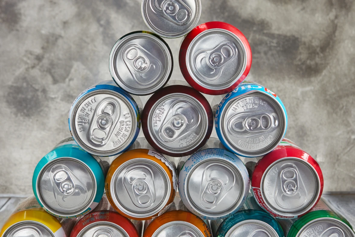 A stack of colorful canned beverages.