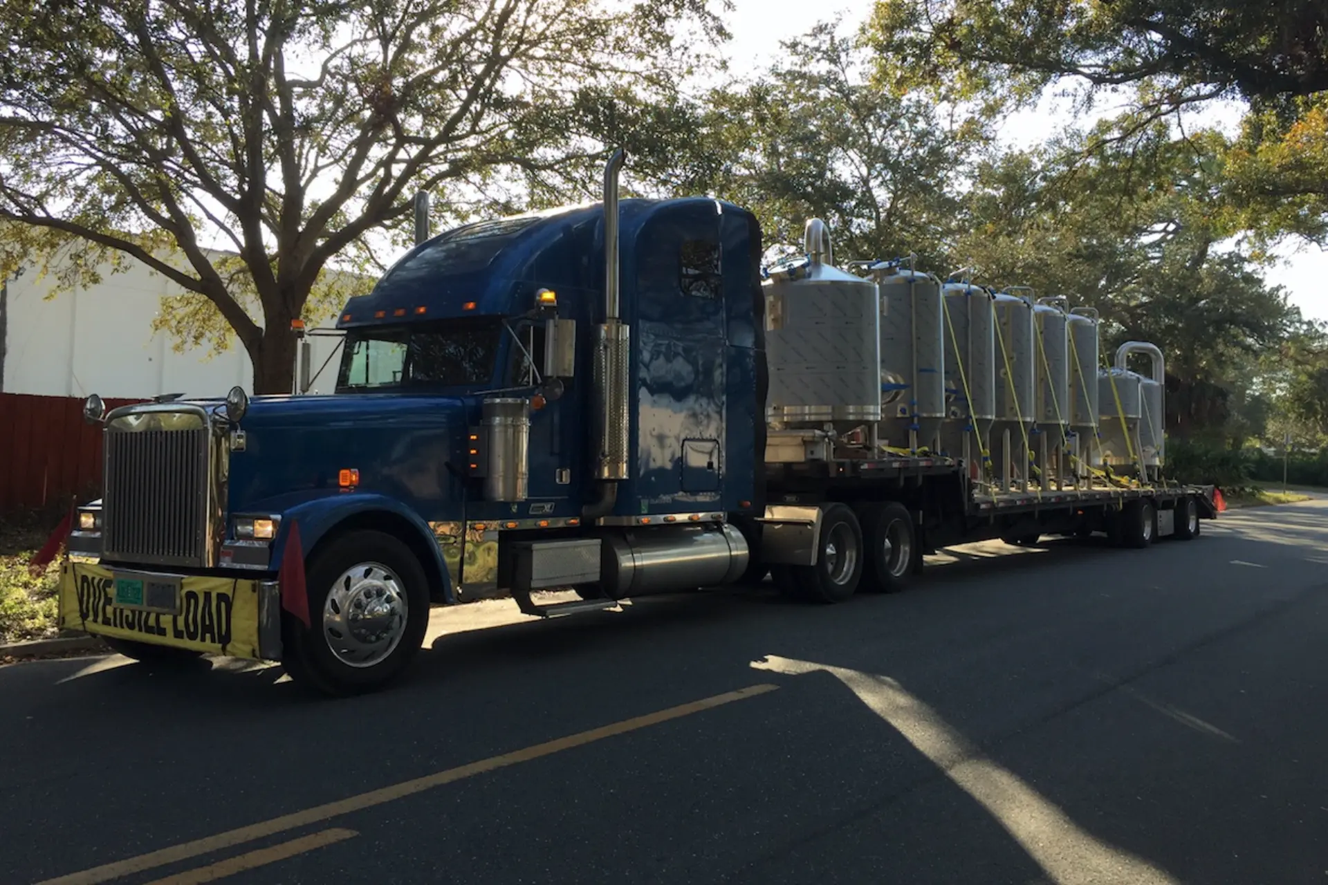 A shipment of beverage equipment on a flatbed